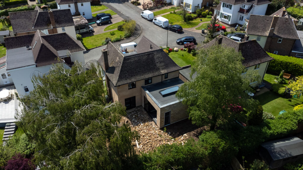 Oakwood, Burgess Hill: double-storey side & single-storey rear extension with new utility room, lounge skylight, underfloor heating, bi-fold doors and full refurbishment.