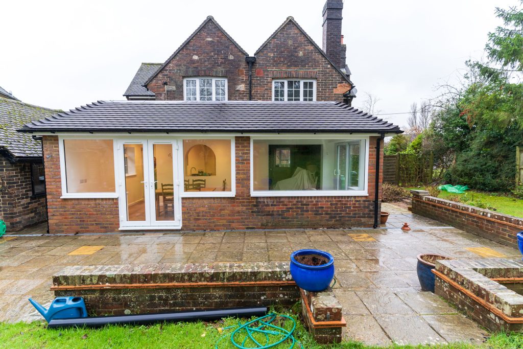 Rear single-storey extension with internal reconfiguration